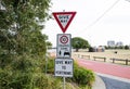 Traffic warning signs for give way, shared zone speed limit 10 km/hr and give way to pedestrians, the image of three traffic signs