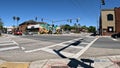 Traffic at a 4 way intersection clear blue sky Royalty Free Stock Photo