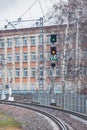 Trafficlight by the railway track. Royalty Free Stock Photo