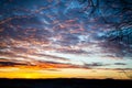 Tragic sky, yellow-pink clouds, sunrise or sunset