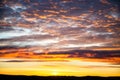 Tragic sky, yellow-pink clouds, sunrise or sunset