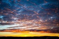 Tragic sky, yellow-pink clouds, sunrise or sunset