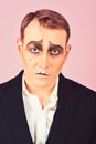 Tragical actor. Man with mime makeup. Mime artist. Mime with face paint. Theatre actor miming. Stage actor miming Royalty Free Stock Photo