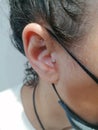 Tragus Piercing with a Titanium Labret