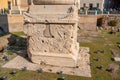 Traian Column detail with ruins of Cesar Forum in Rome. bottom of Trajan column Royalty Free Stock Photo