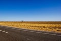 traight road in the dessert of Australia on the Flinders Hightway, Quennsland Australia