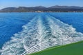 Trail behind the ferry boat on water surface in the Lofoten Is Royalty Free Stock Photo