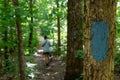 Trail blaze with hiker in Alabama