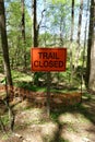 `Trail Closed` Sign in the Middle of the Forest