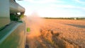 Trail of dust behind combine.