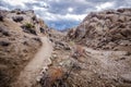 Trail through giant boulders to the Moibus Arch in Alabama Hills California, in the Eastern Sierra Nevada mountains