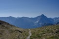 Trail Heads Down Over Mountain from Siyeh Pass Royalty Free Stock Photo