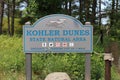 A trail hiking sign at Kohler Dunes State Natural Area for the Kohler Dunes Cordwalk trail in Sheboygan, Wisconsin