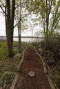 Trail leads to a pier on the lake