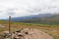 Trail marker leading to Colorado mountain peak