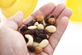 Trail mix in hand palm Royalty Free Stock Photo