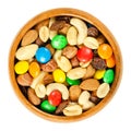 Trail mix in wooden bowl over white Royalty Free Stock Photo