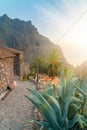 Trail near small buildings with a view on a sunset over Masca Village and valley in Tenerife, Canary Islands, Spain Royalty Free Stock Photo