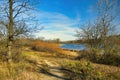 Trail Passing by a Small Lake in Late Autumn Royalty Free Stock Photo