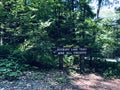 The trail path and trail route marker inside Mine Hills Preserve