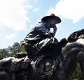 Sculpture of a trail boss on his horse