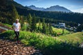 Trail runner athlete train in green nature, mountains in background Royalty Free Stock Photo