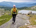 Trail running woman cross country in mountains on summer beautiful day Royalty Free Stock Photo