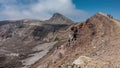 The trail runs along the edge of a volcanic crater.