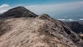 The trail runs along the edge of the volcano crater. Royalty Free Stock Photo