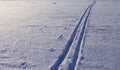 Trail from the ski run on the river snow in the spring