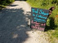 Trail subject to flooding enter at own risk sign Royalty Free Stock Photo