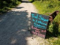 trail subject to flooding sign on trail or path Royalty Free Stock Photo