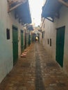 Trail in Tetouan Medina between green wooden doors