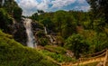 Trail to beautiful Wachirathan waterfall surrounded by lush tropical forest in Doi Inthanon National Park nera Chiang Mai Royalty Free Stock Photo