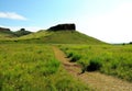 A trail to the top of the hill to the ancient sanctuary, following the remains of the ancient walls