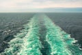 trail on the water from the ship. The propellers of the ship sme