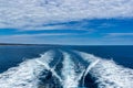 Trail on water surface behind of fast moving motor boat, Western Australia Royalty Free Stock Photo