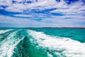 Trail on water surface behind of fast moving motor boat, Western Australia Royalty Free Stock Photo