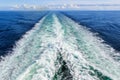 Trail on water surface behind the ferry Royalty Free Stock Photo