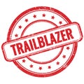 TRAILBLAZER text on red grungy round rubber stamp