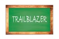 TRAILBLAZER text written on green school board