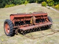 Trailed seeder for crops stands in the field