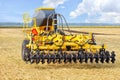 Trailed single-chamber bunker for aggregation with tillage machines, namely for fertilization against the background of yellow