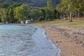 Trailer car near sea bay shore line nature beautiful landscape place in evening time before sunset with soft orange color Royalty Free Stock Photo