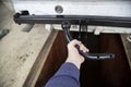 Trailer coupling.Installing a towbar on a passenger car.Cargo transportation by passenger car Royalty Free Stock Photo