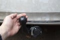 Trailer coupling.Installing a towbar on a passenger car.Cargo transportation by passenger car Royalty Free Stock Photo
