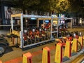 A trailer delivers popular rental bikes at night to a station in Barcelona, Spain.