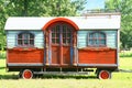 A trailer in a meadow