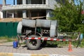 Trailer with the old diesel compressor. Mobile compressor parked at building site