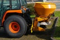 Trailer on a tractor for spreading road salt on icy sections of the road. Royalty Free Stock Photo